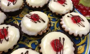 Collesano Cassatine: A Madonie Treat Glazed in Sweet White Icing