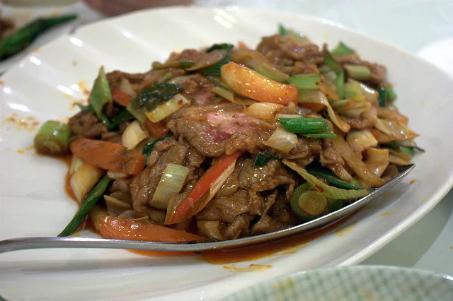 Mutton in white sauce served in a casserole