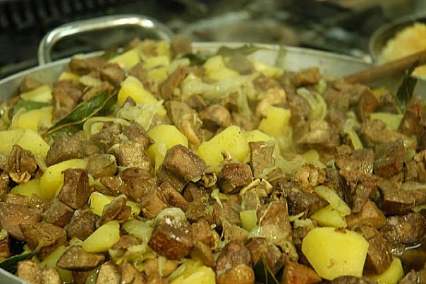 Lamb offal cooked with potatoes