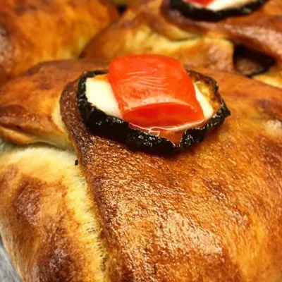 Courgette and Cherry Tomato Faggottini: A Delicious Slice of Sicilian Tradition