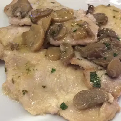 Veal Scaloppine with Mushrooms: A Sicilian Classic