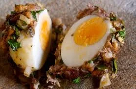 Sicilian Priore’s Eggs served with porcini, ham and chicken liver